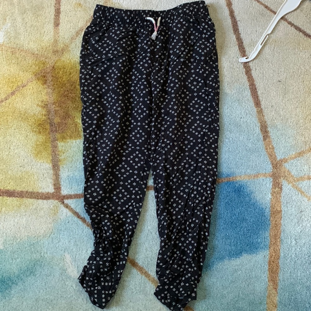 Small/ medium, black with white design